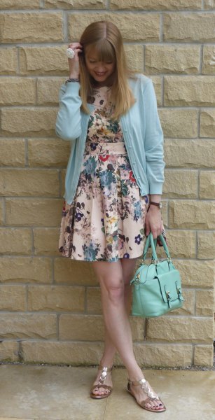sky blue cardigan with floral printed mini dress and gold sandals