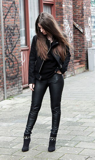 black denim jacket with leather leggings and suede boots