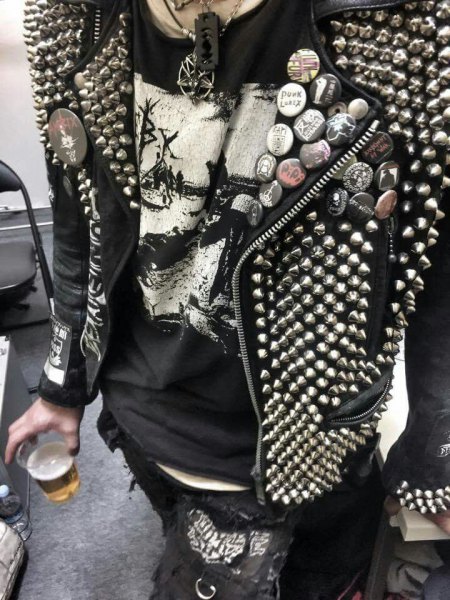 Leather jacket with rivets and graphic t-shirt