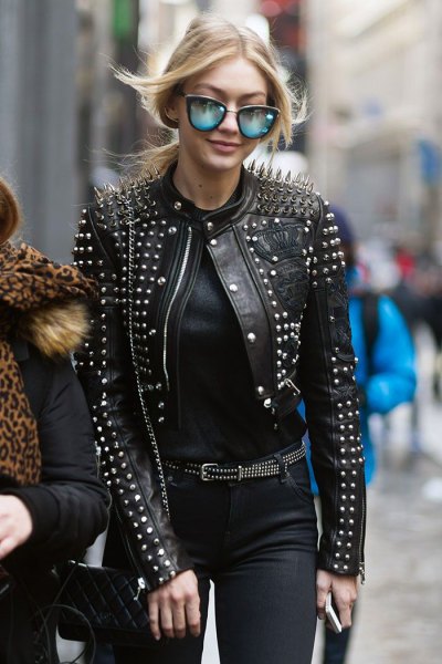 black leather jacket with spikes and skinny jeans