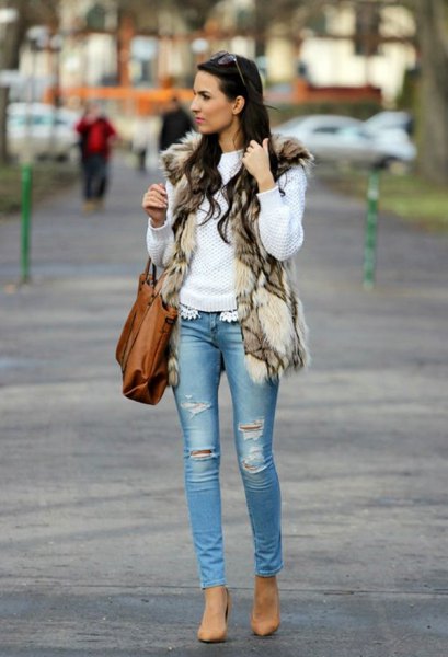 Faux fur vest with white knitted sweater