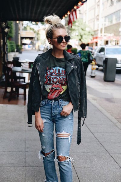 black leather jacket with graphic t-shirt and torn jeans