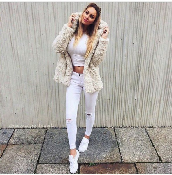 Fuzzy faux fur jacket with white ankle jeans