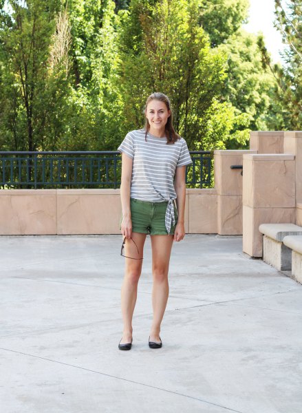 gray and white striped t-shirt with green mini shorts