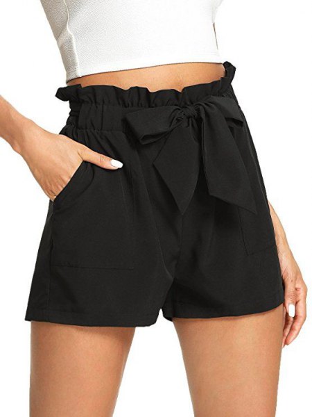 white cut, fitted t-shirt with black, elastic waist shorts