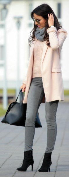 white rib sweater with gray skinny jeans and ankle boots with heels