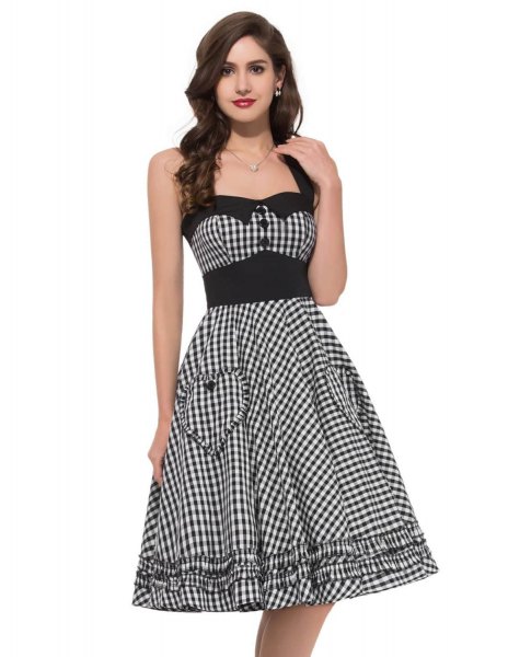black and white checkered fit and flared midi dress with a square neckline