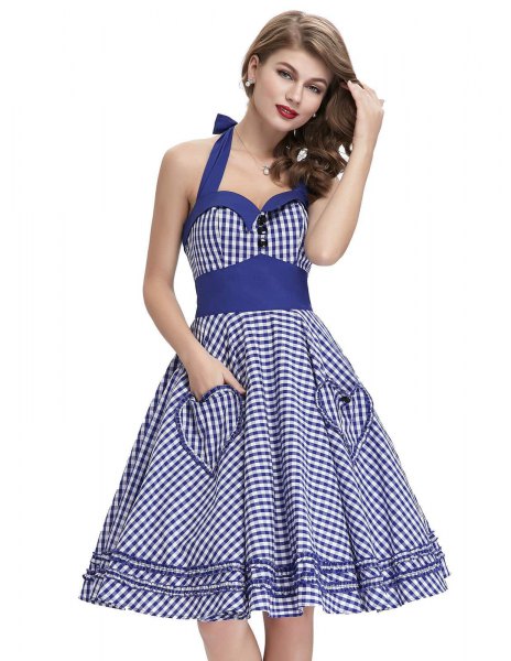 blue and white halter fit and flared dress with a sweetheart neckline