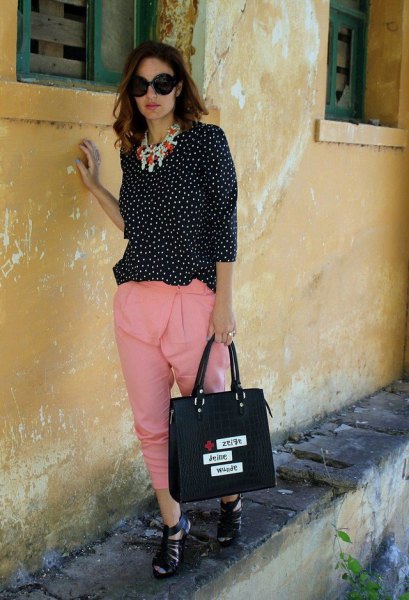 black and white dotted blouse with blushing, pink, cropped pants