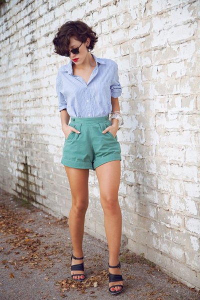 blue shirt with buttons and gray vintage shorts