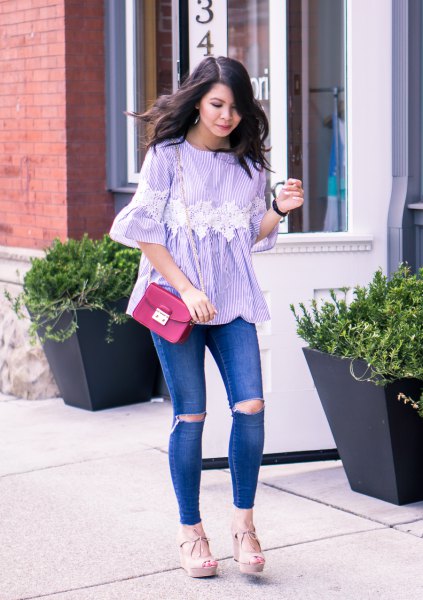 blue and white striped bell-sleeved blouse with torn jeans