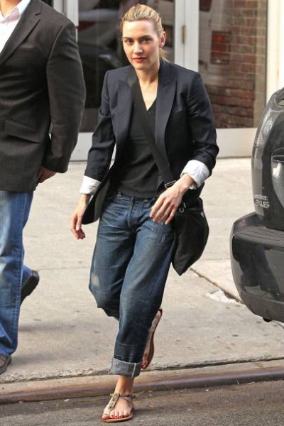 black oversized blazer with v-neck t-shirt and dark baggy jeans