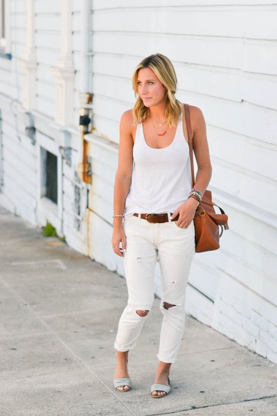 white tank top with scoop neck and torn jeans