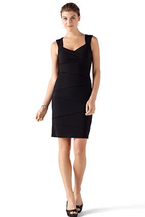 black sleeveless, form-fitting mini dress with V-neck and open toe heels