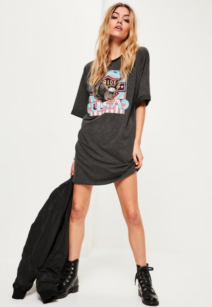 gray graphic t-shirt dress with black bomber jacket and boots