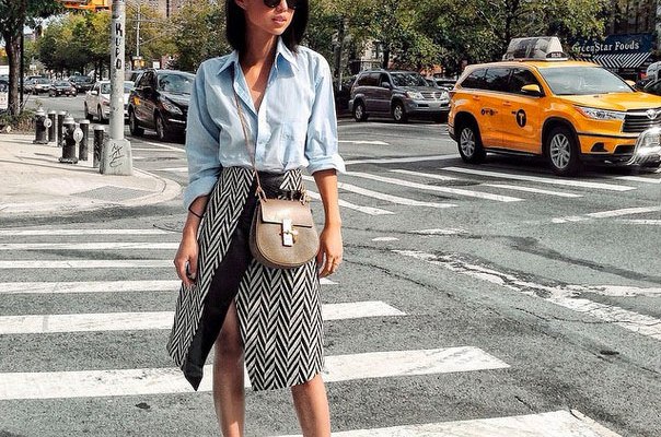 Light blue chambray shirt with buttons and midi skirt with zigzag pattern