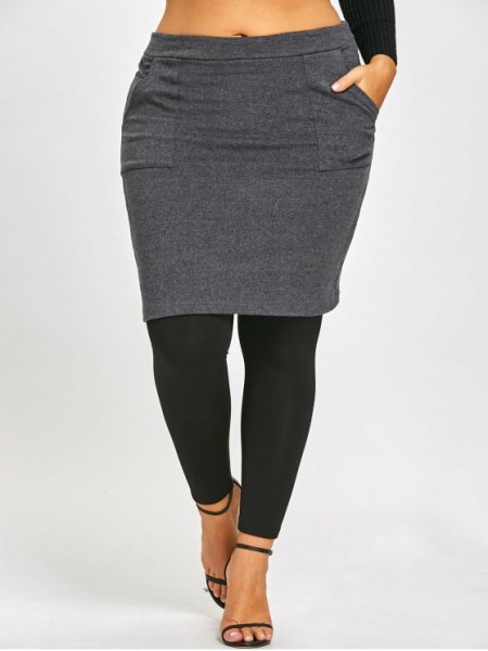 gray and black skirt leggings and short-cut long-sleeved T-shirt