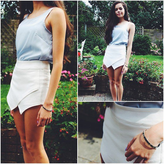 gray tank top with scoop neck and white mini skirt