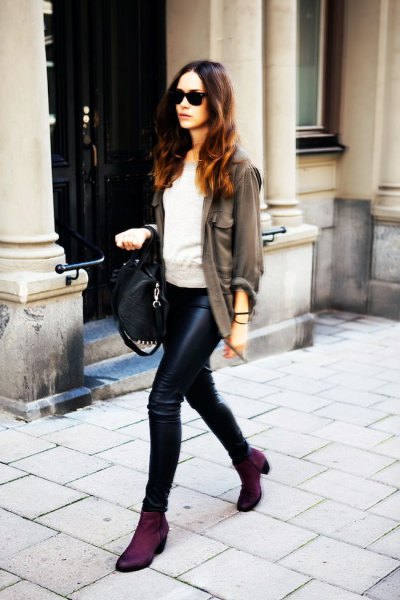 gray blazer with light gray sweater and leather pants