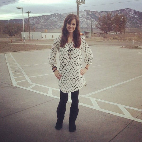 white and black printed tunic blouse with black fleece lined leggings and boots