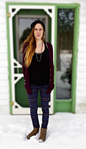 black tank top with a scoop neck, cardigan and tribal fleece leggings