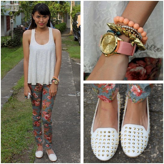 Tank tap with floral patterned tube pants and white loafers with spikes