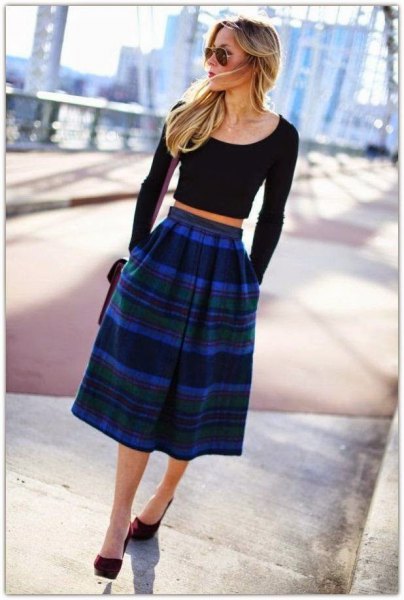 black cropped sweater with blue checked midi skirt