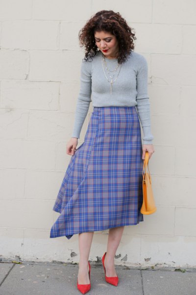 tailored sweater with blue and gray midi skirt