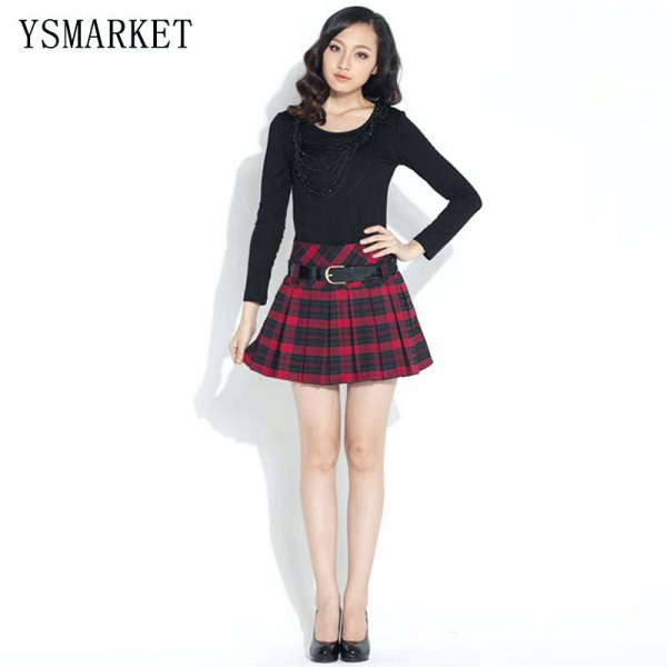 black long-sleeved t-shirt with a scoop neck and red checkered mini skirt