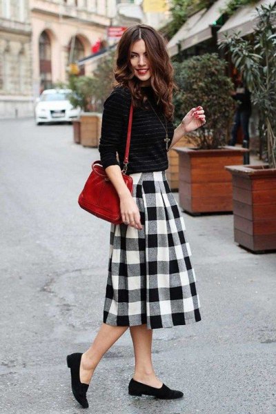 Knitted sweater with black and white midi wool skirt