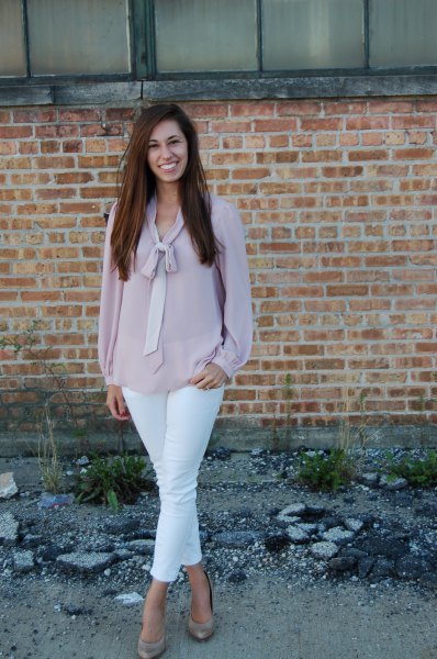blushing pink chiffon blouse with white ankle jeans