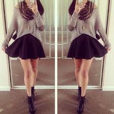 gray sweater with a relaxed fit, scarf and black mini-skirt