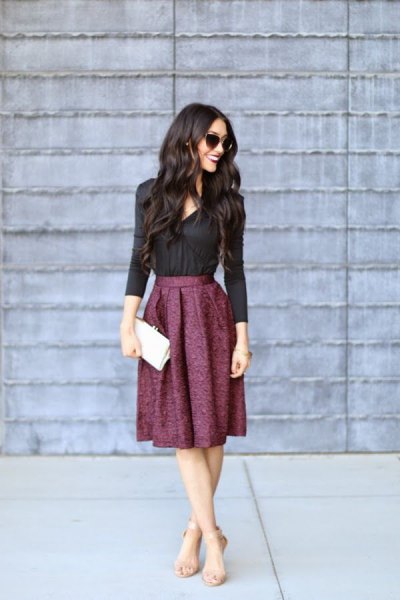 black shirt with buttons and midi pleated skirt made of wool