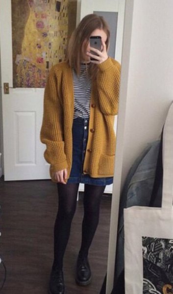 roughly ribbed cardigan with a striped t-shirt and denim skirt with a button placket