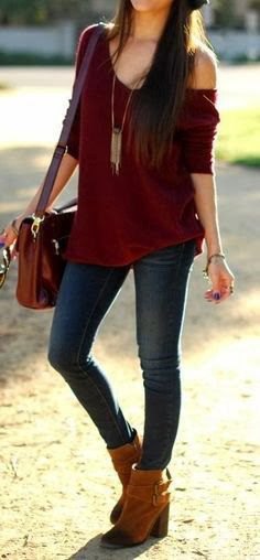 maroon sweater with a shoulder and relaxed fit and long boho style necklace