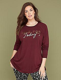 burgundy long sleeve graphic t-shirt with black and white polka dot pants