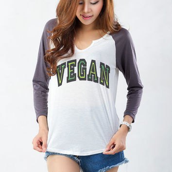 gray and white funny long sleeve graphic tee with blue denim mini shorts
