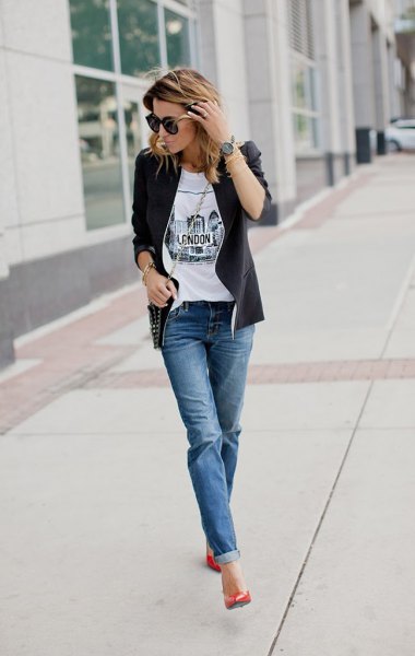 black leather jacket with white tee and blue cuffed jeans