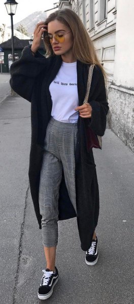 black maxi sweater cardigan with white graphic tee and gray jog book