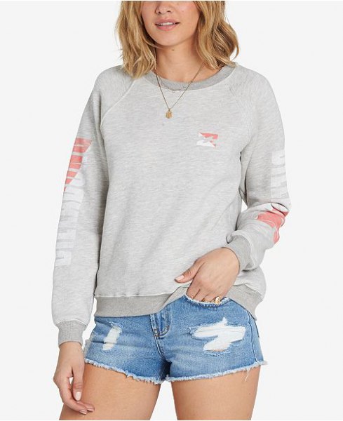 light gray printed sweater with blue denim mini shorts