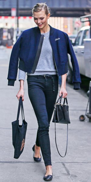 dark blue jacket with gray sweater and jeans with high waist