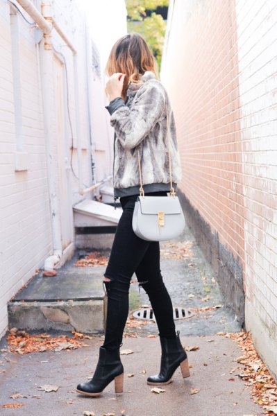 light gray jacket with black ripped skinny jeans and black leather shoes with leather