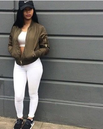 white crop top with matching slim jeans and green bomber jacket