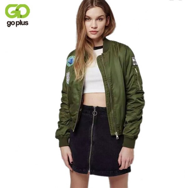 embroidered olive bomber jacket with white crop top and black high-rise