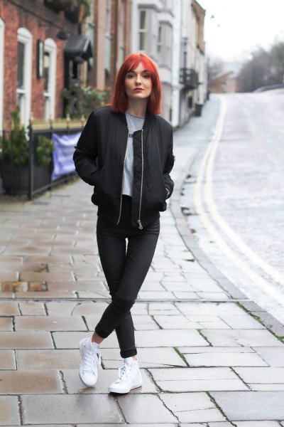 black jacket with matching slim jeans and white sneakers
