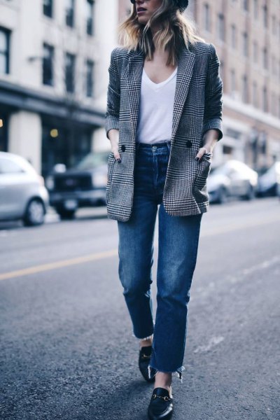 gray plaid jacket with white top with shoe neck and jeans with high waist