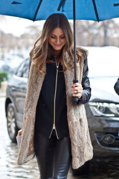 long light brown vest with black motorcycle jacket and leather clothes