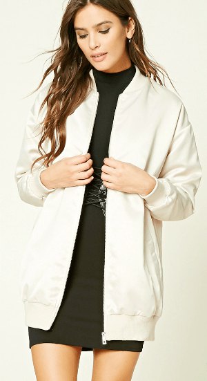long white white bomber jacket with black shift dress in black mock