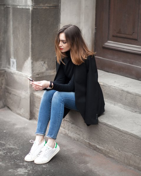 black wool coat with hollow sweater and mom jeans in ankle