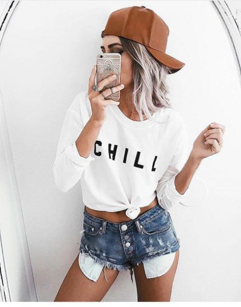 white knotted long sleeve t-shirt with high waisted distressed shorts
